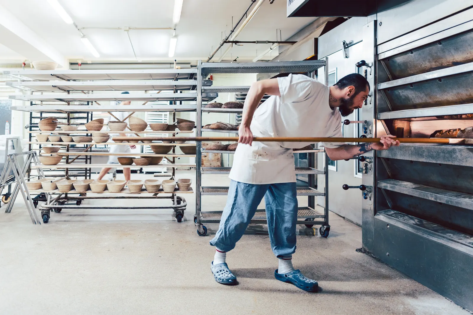 Baker checking bread