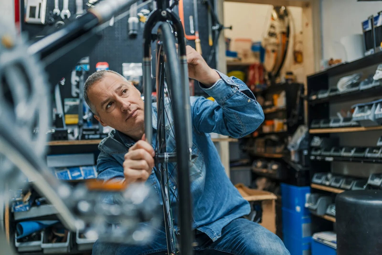 Bike shop owner at work