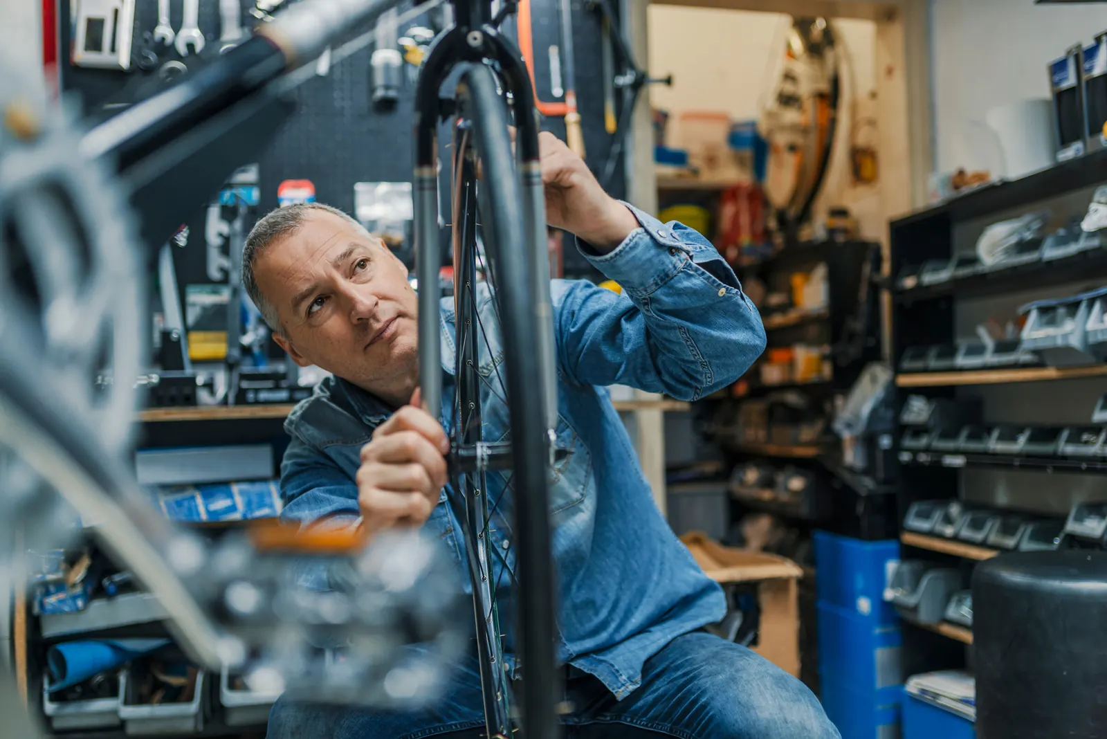 Bike shop owner at work