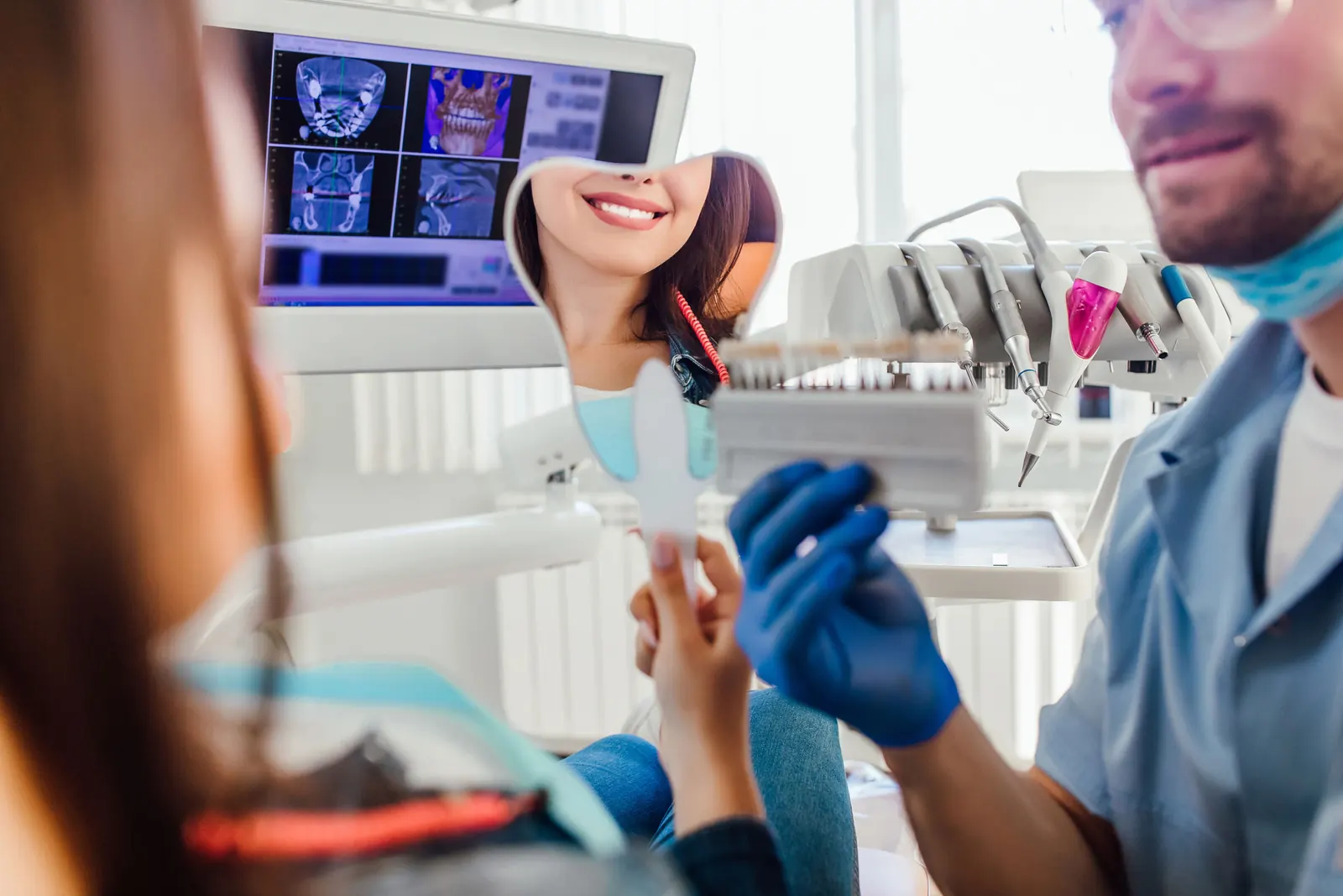 Dental patient checking her smile