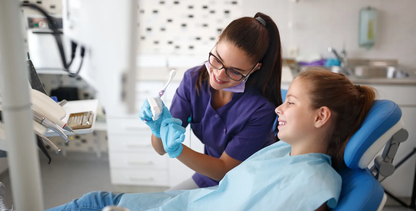 Dentist with a young patient
