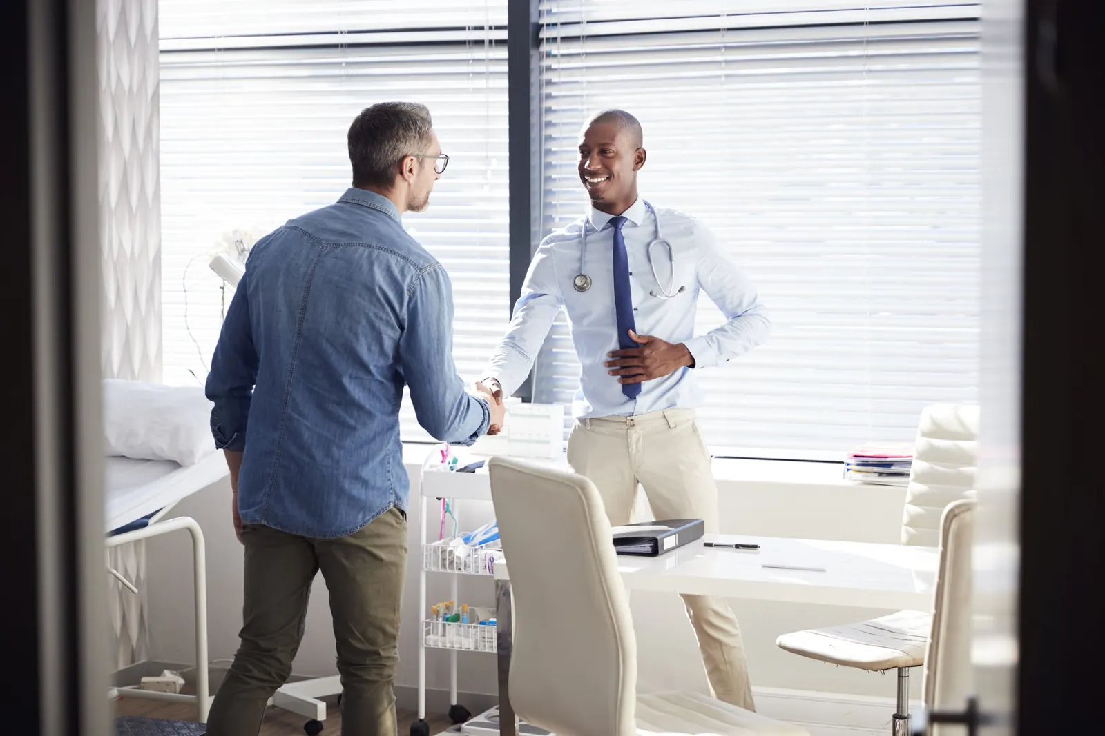 Doctor greeting a patient