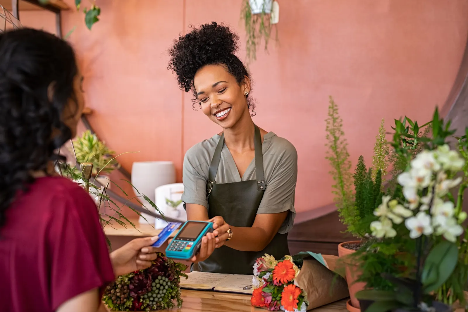 Florist taking a card payment