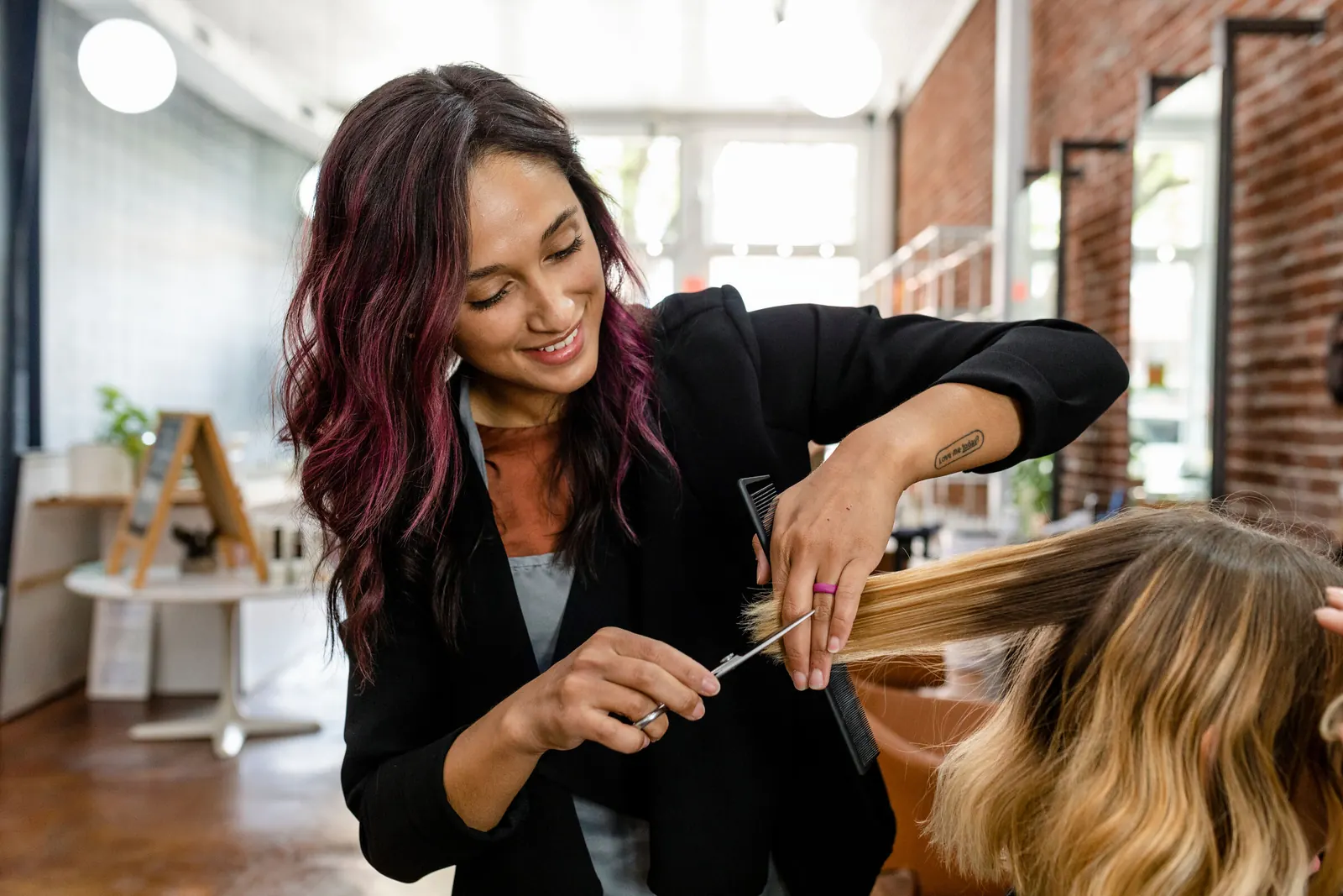 Hairstylist with a client